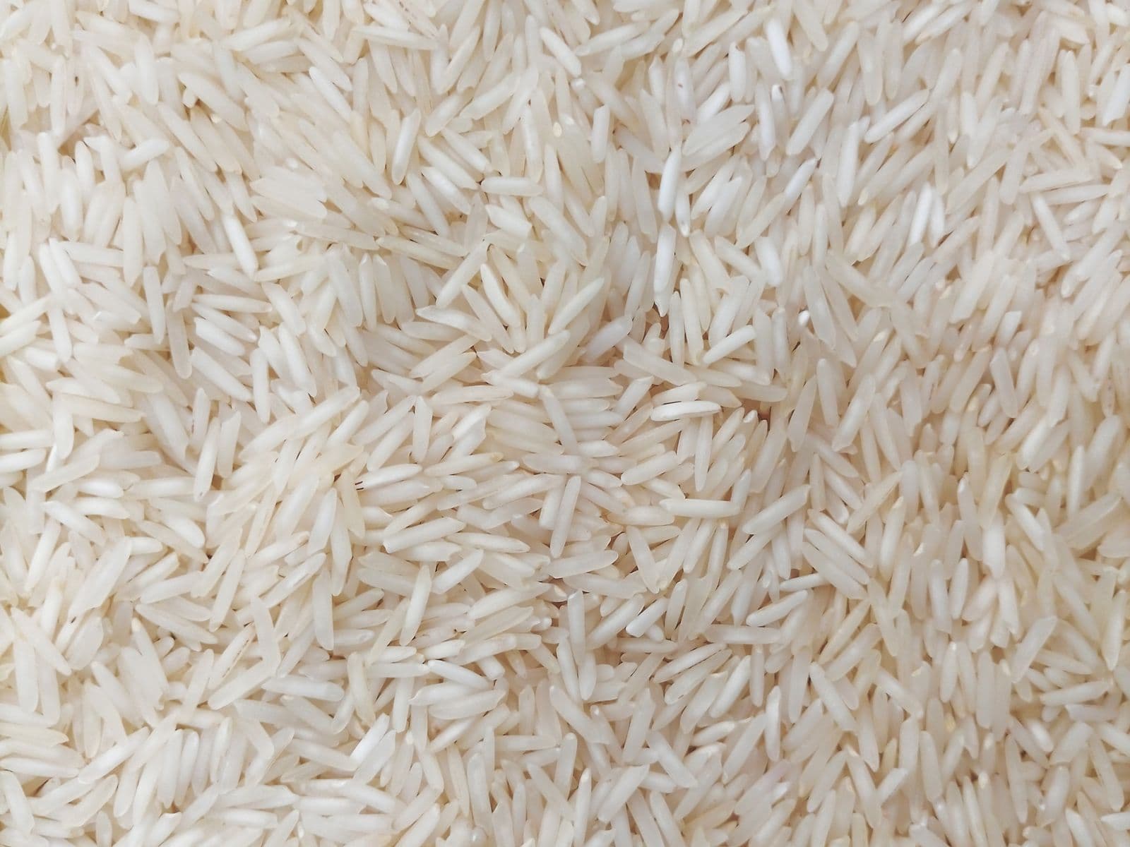 Long, slender white basmati grains filling the frame.