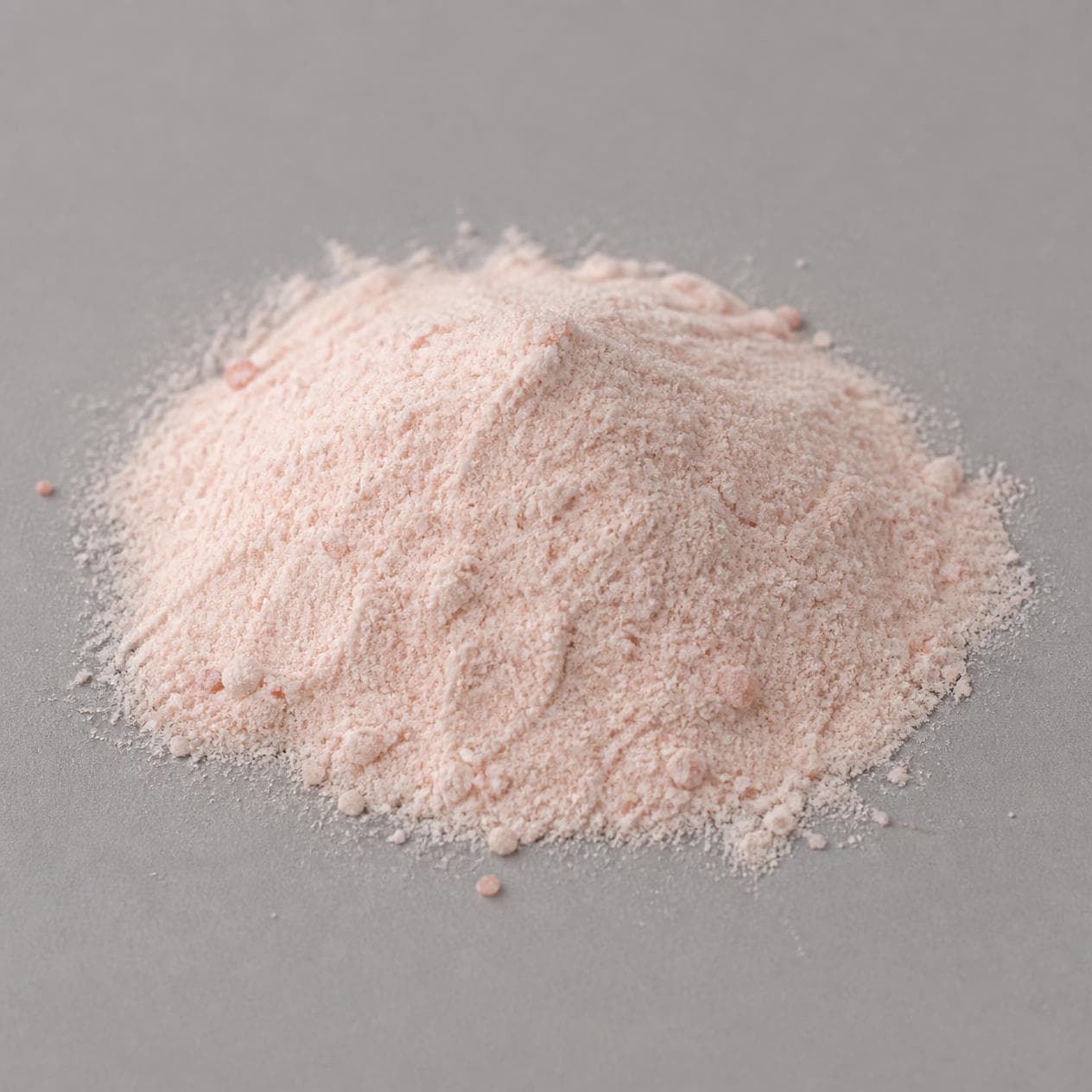 Deep pink rock salt milled to a powder.